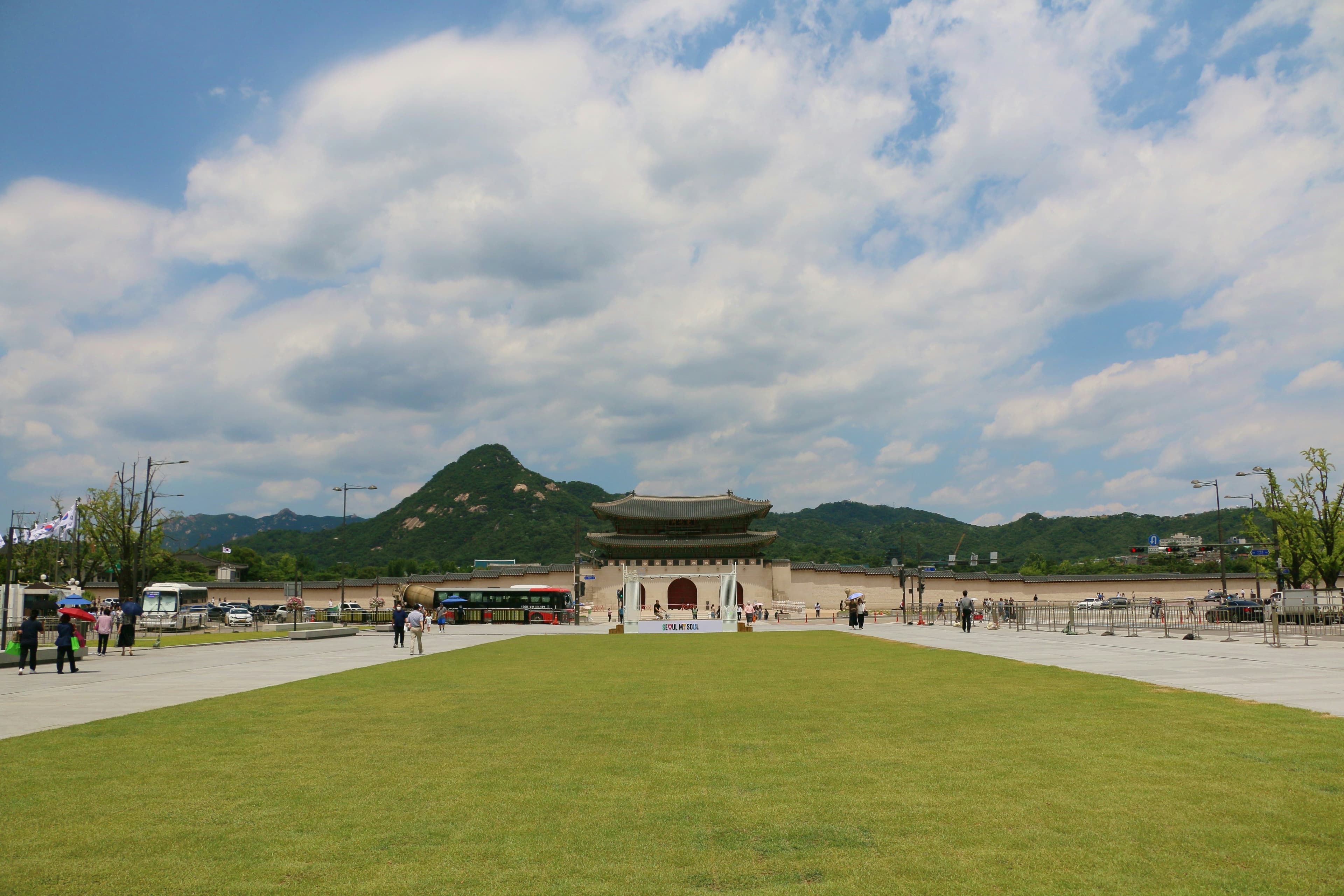 Gwanghwamun Gate and Bugaksan Mountain under open skies in Seoul, South Korea